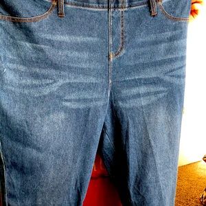 Worn jeggings that are listed as a 20/22